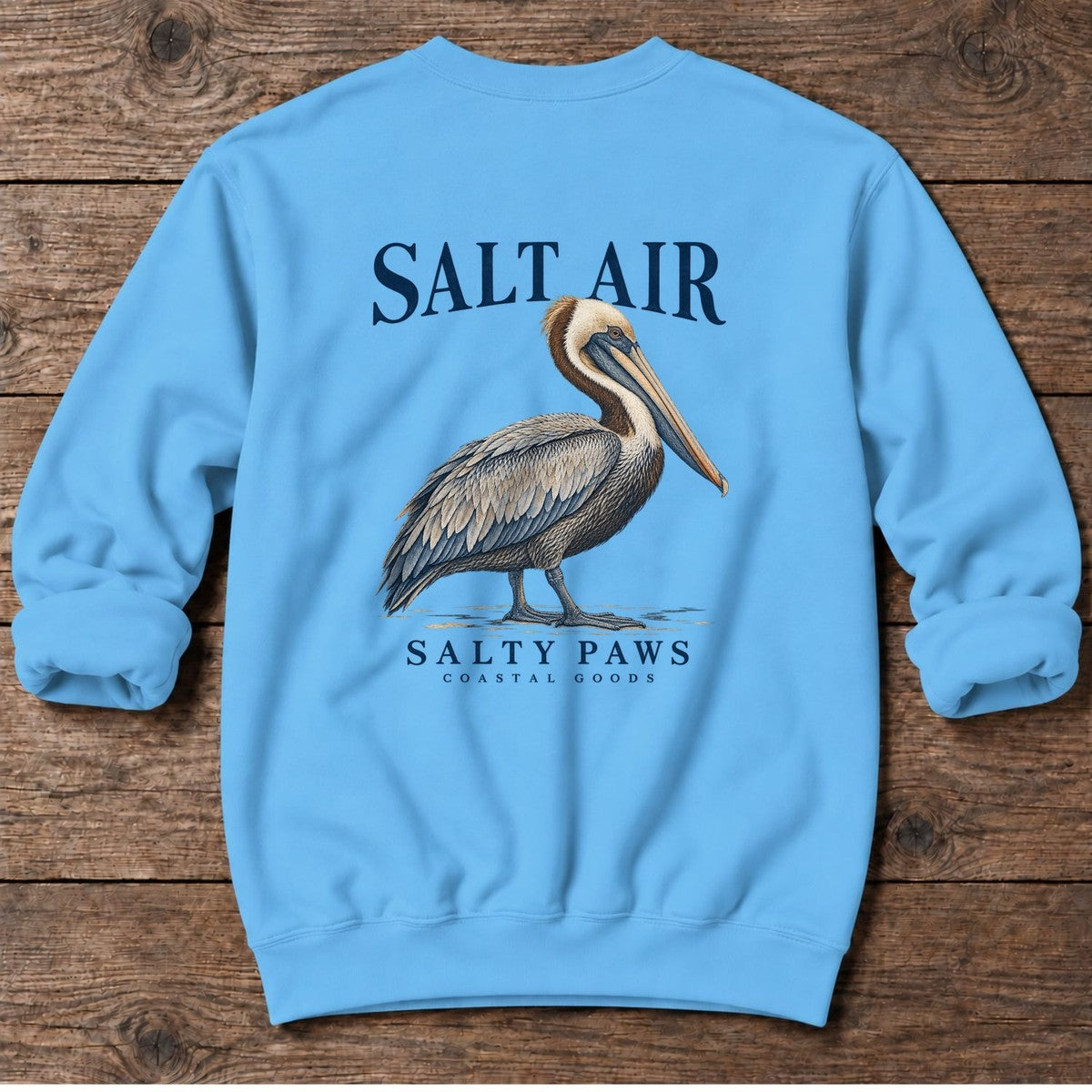 Salt Air Pelican Salty Paws Coastal Goods Back Design Midweight Sweatshirt in Sky, Salty Paws Midweight Sweatshirt, back design flat lay