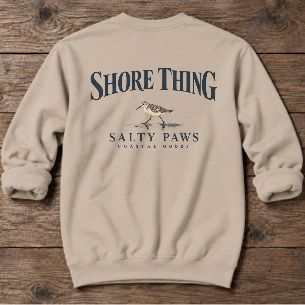 Shore Thing Sandpiper Salty Paws Coastal Goods Back Design Midweight Sweatshirt in Sand, Salty Paws Midweight Sweatshirt, back design flat lay