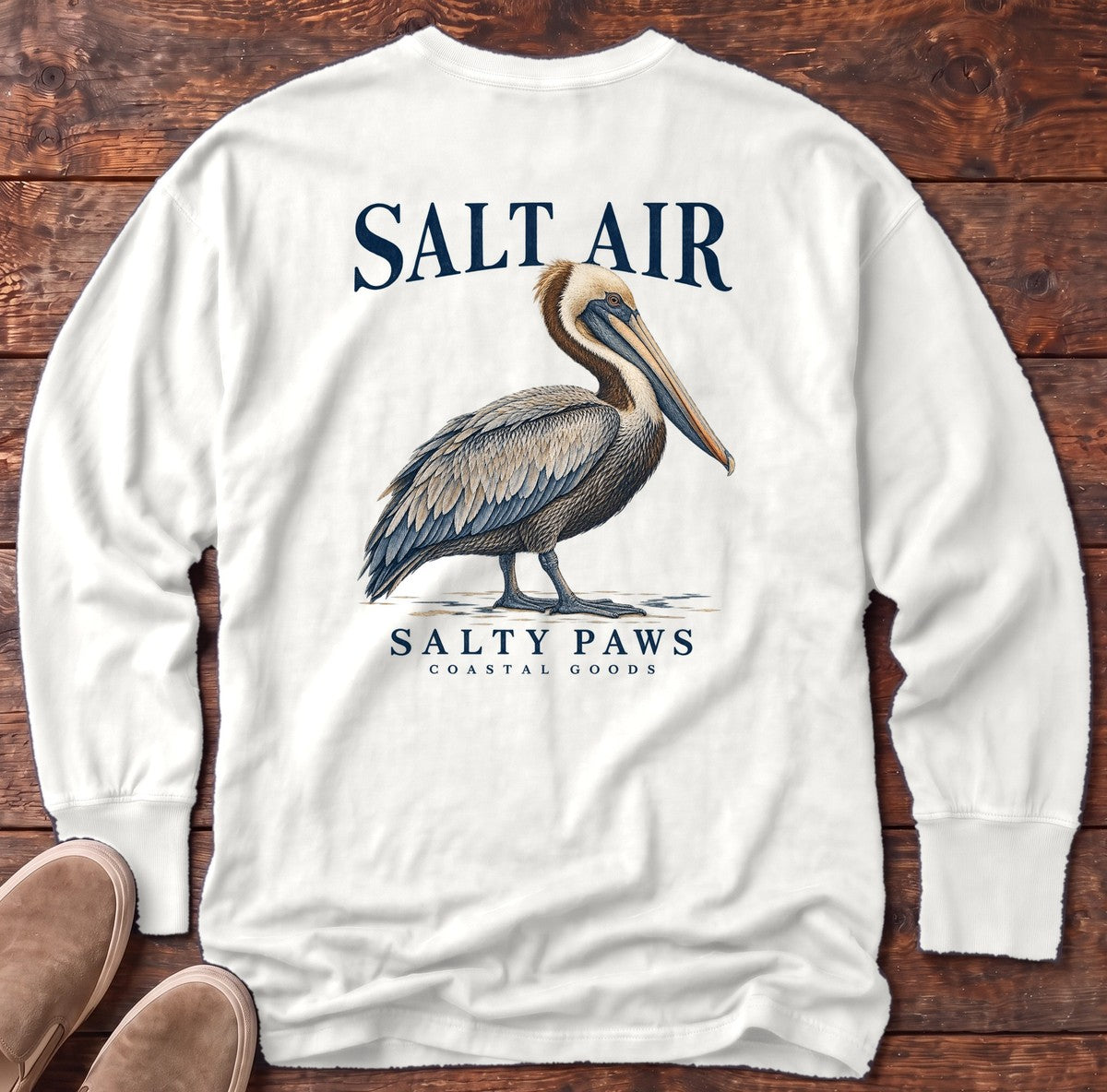 Salt Air Pelican Salty Paws Coastal Goods Back Design Long Sleeve Tee in White, Salty Paws Comfort Colors Long Sleeve Tee, back design flat lay