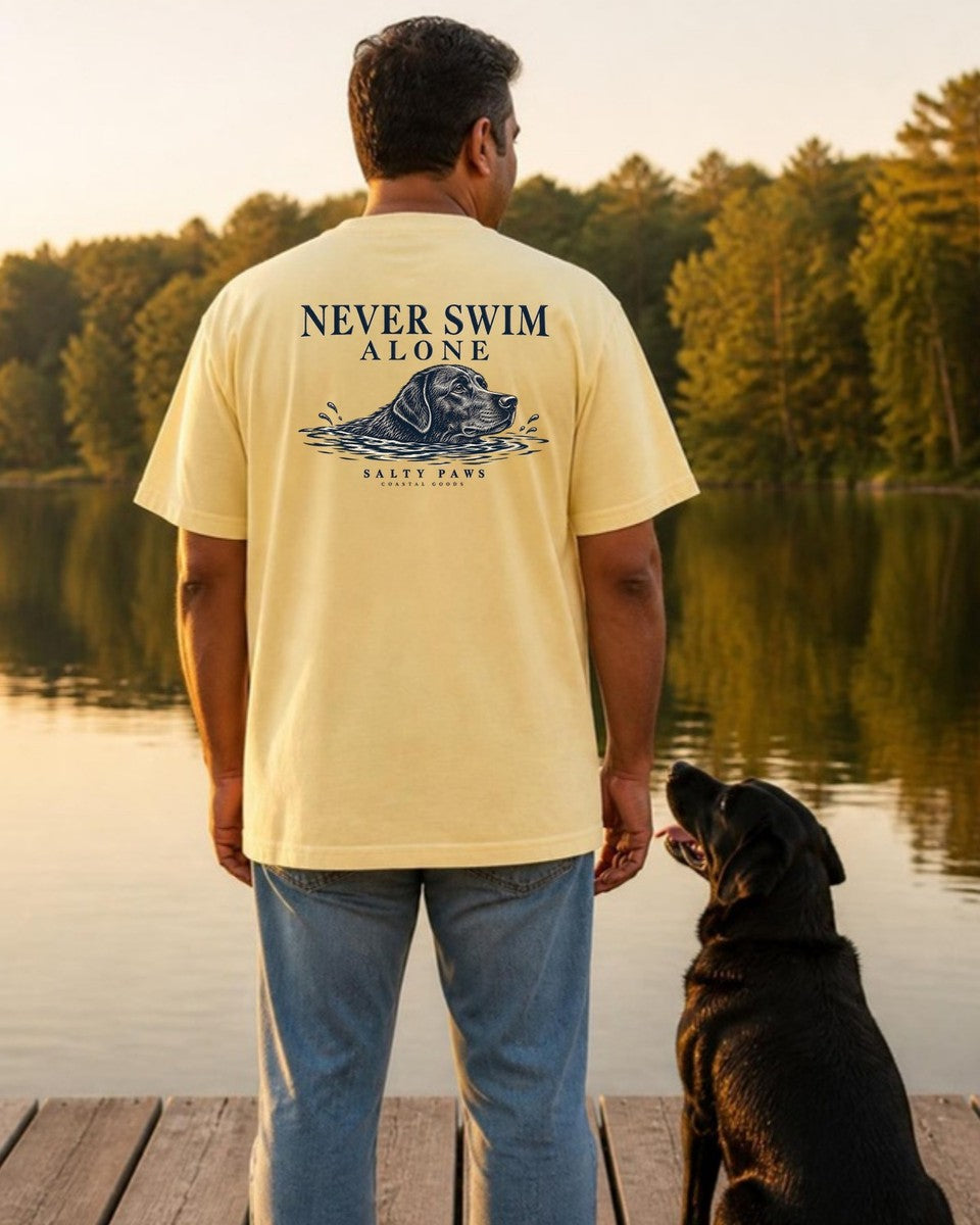 Never Swim Alone Black Lab Comfort Colors T-Shirt in Butter, worn by a model
