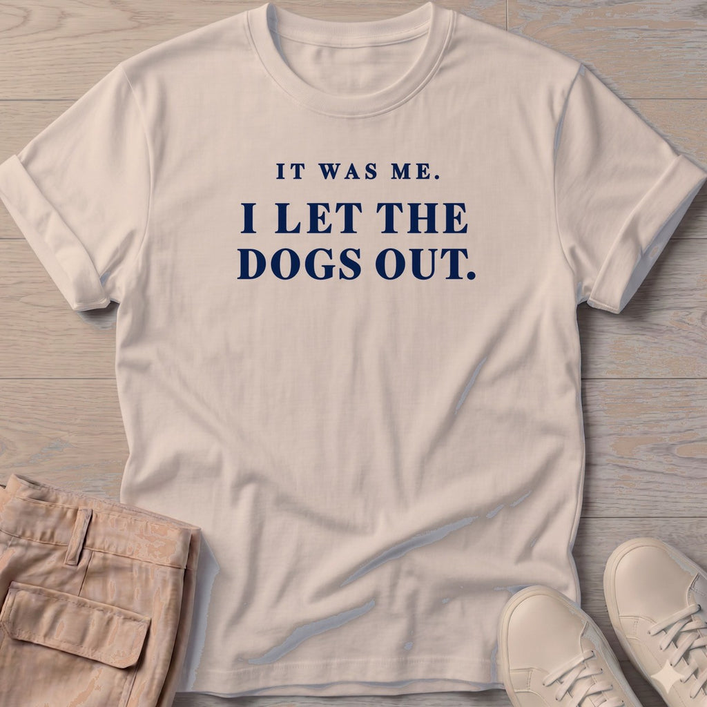 It Was Me I Let the Dogs Out T-Shirt in Sand, Salty Paws T-Shirt, front design flat lay