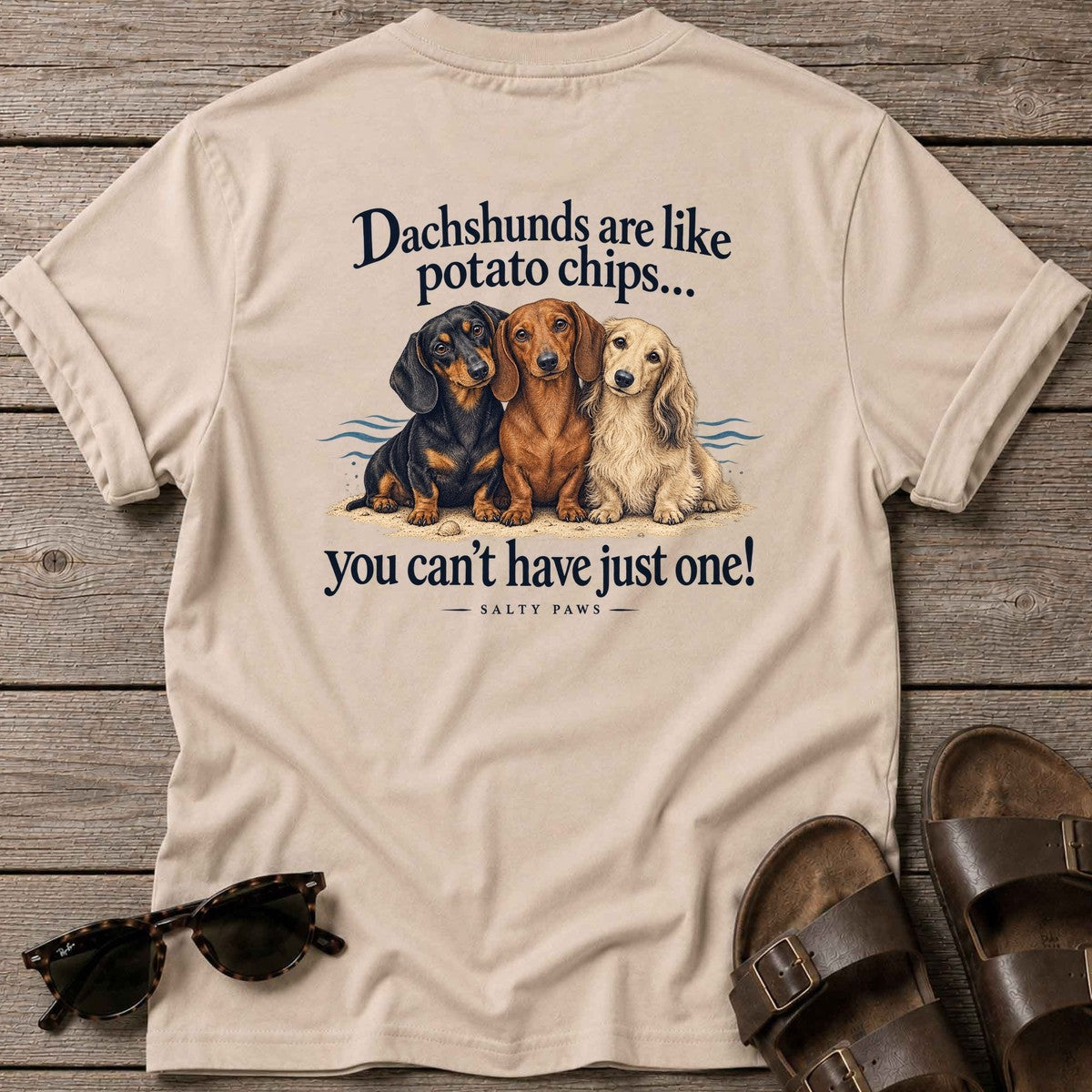 Dachshunds Are Like Potato Chips Back Design T-Shirt in Sand, Salty Paws T-Shirt, back design flat lay