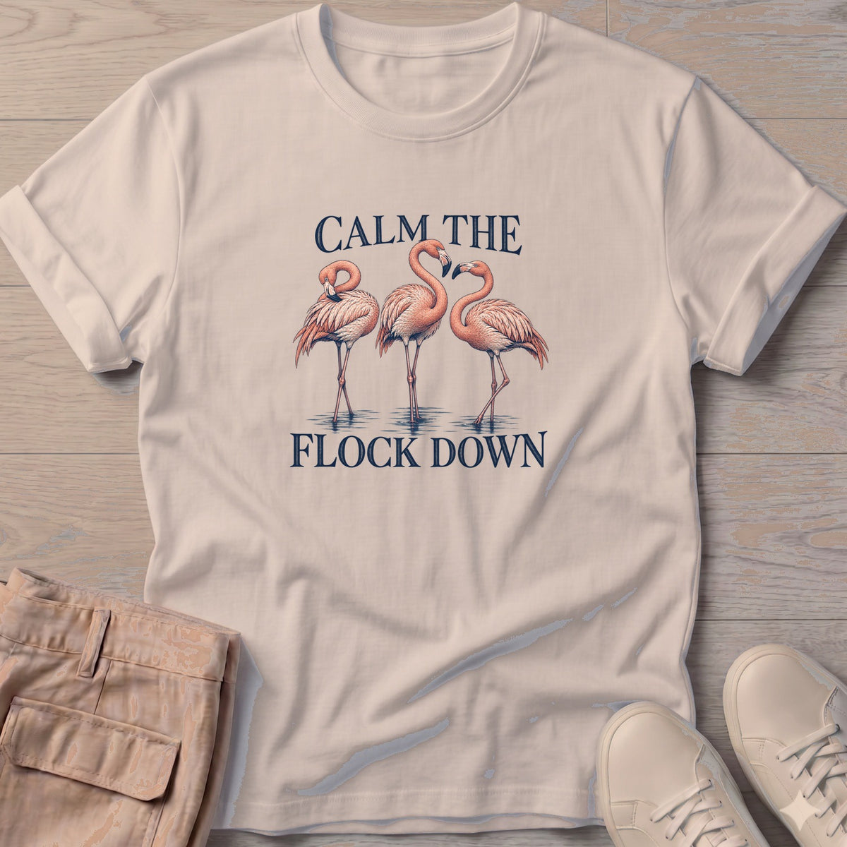 Calm Flock Flamingo Soft Style T-Shirt in Sand, Salty Paws Soft Style T-Shirt, front design flat lay