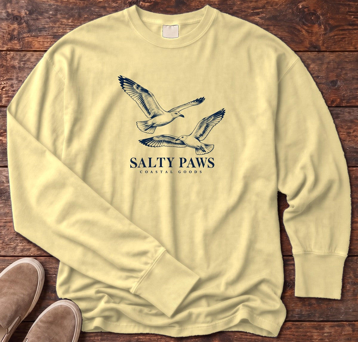 Gull Flight Coastal Goods Long Sleeve Tee in Butter, Salty Paws Comfort Colors Long Sleeve Tee, front design flat lay
