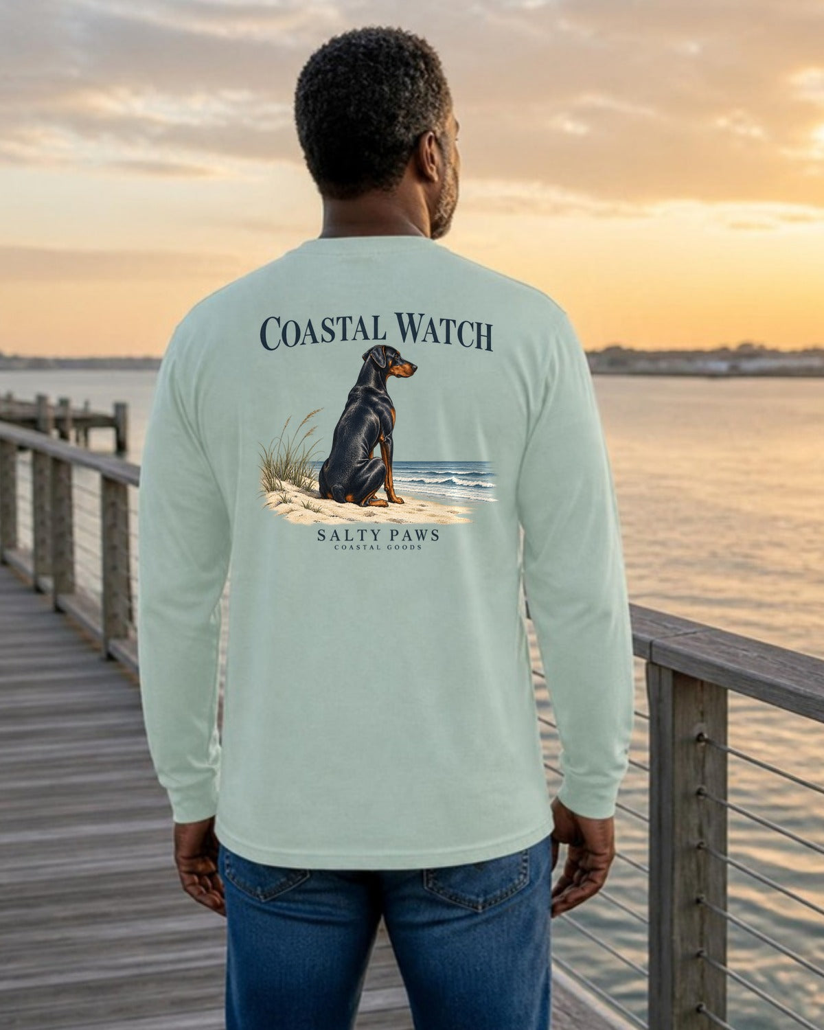 Coastal Watch Doberman Salty Paws Coastal Goods Back Design Long Sleeve Tee in Chalky Mint, worn by a model, Salty Paws back design