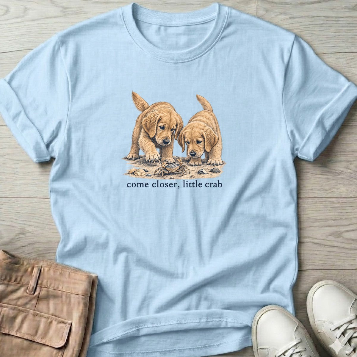 Come Closer Little Crab Golden Puppies T-Shirt in Light Blue, Salty Paws T-Shirt, front design flat lay