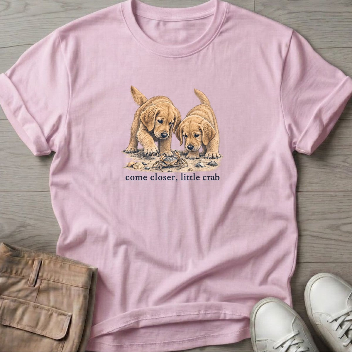Come Closer Little Crab Golden Puppies T-Shirt in Light Pink, Salty Paws T-Shirt, front design flat lay