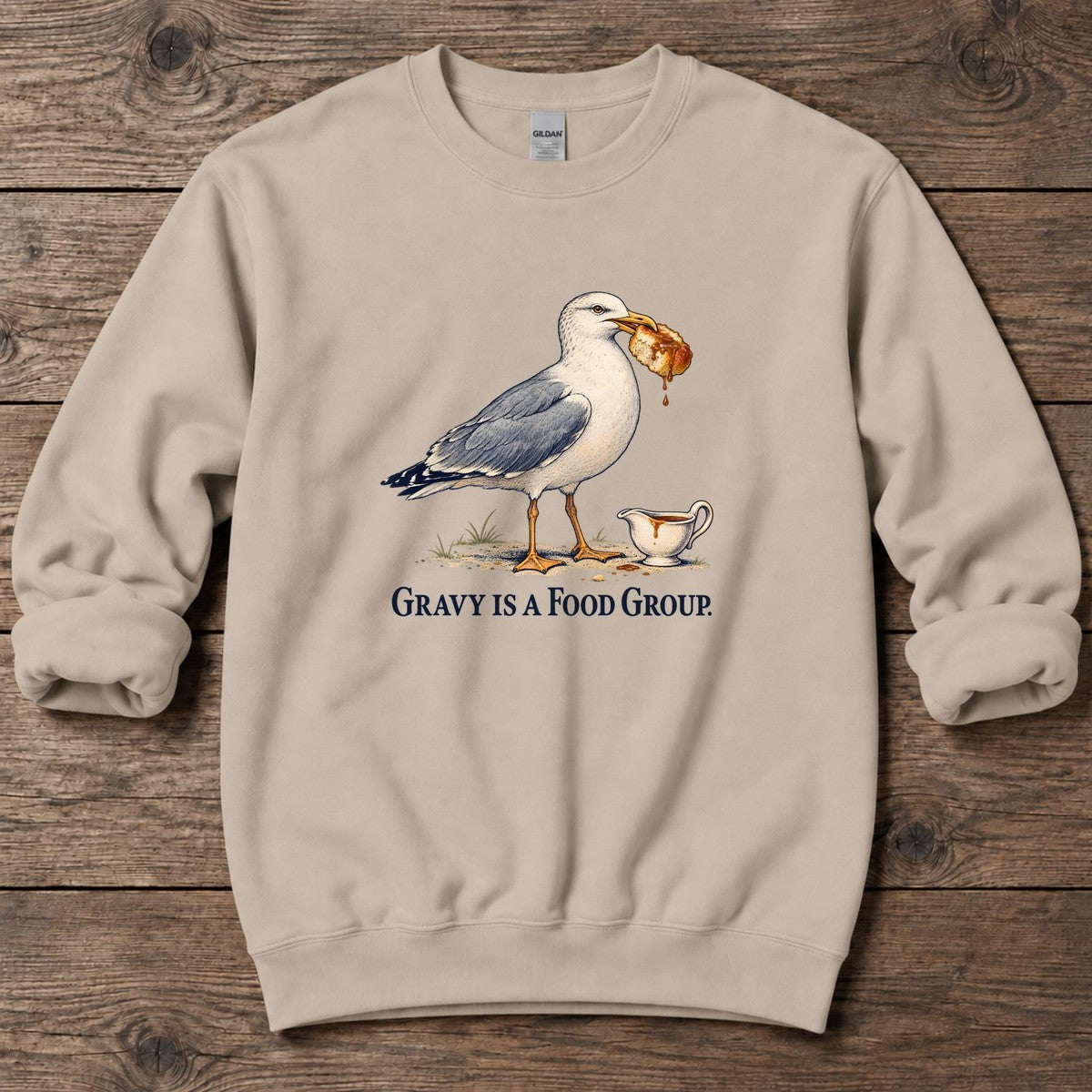 Gravy Is a Food Group Seagull Midweight Sweatshirt in Sand, Salty Paws Midweight Sweatshirt, front design flat lay
