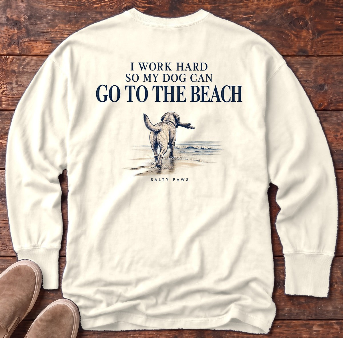 I Work Hard So My Dog Can Go to the Beach Back Design Long Sleeve Tee in Ivory, Salty Paws Comfort Colors Long Sleeve Tee, back design flat lay