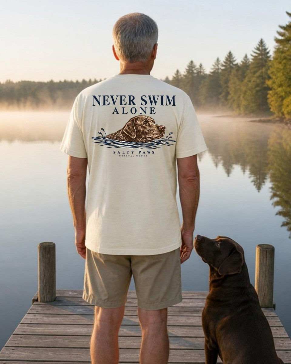 Never Swim Alone Chocolate Lab Back Design Comfort Colors T-Shirt in Ivory, worn by a model