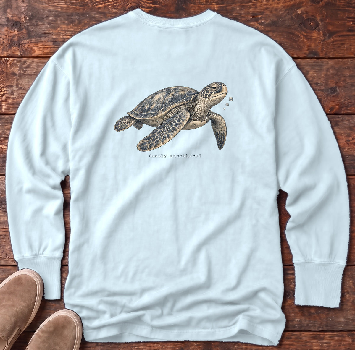 Deeply Unbothered Sea Turtle Back Design Long Sleeve Tee Comfort Colors in Chambray, Salty Paws Comfort Colors Long Sleeve Tee, back design flat lay