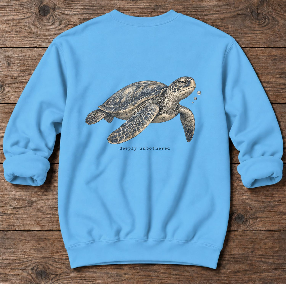 Deeply Unbothered Sea Turtle Back Design Midweight Sweatshirt in Sky, Salty Paws Midweight Sweatshirt, back design flat lay
