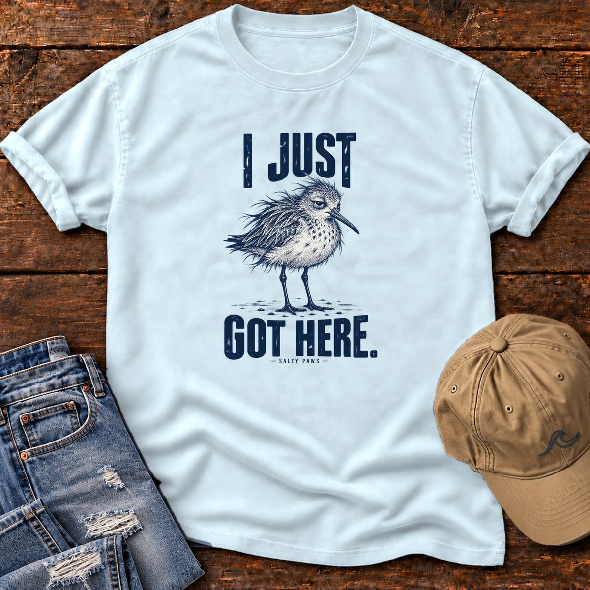 I Just Got Here Sandpiper T-Shirt in Chambray, Salty Paws Comfort Colors T-Shirt, front design flat lay