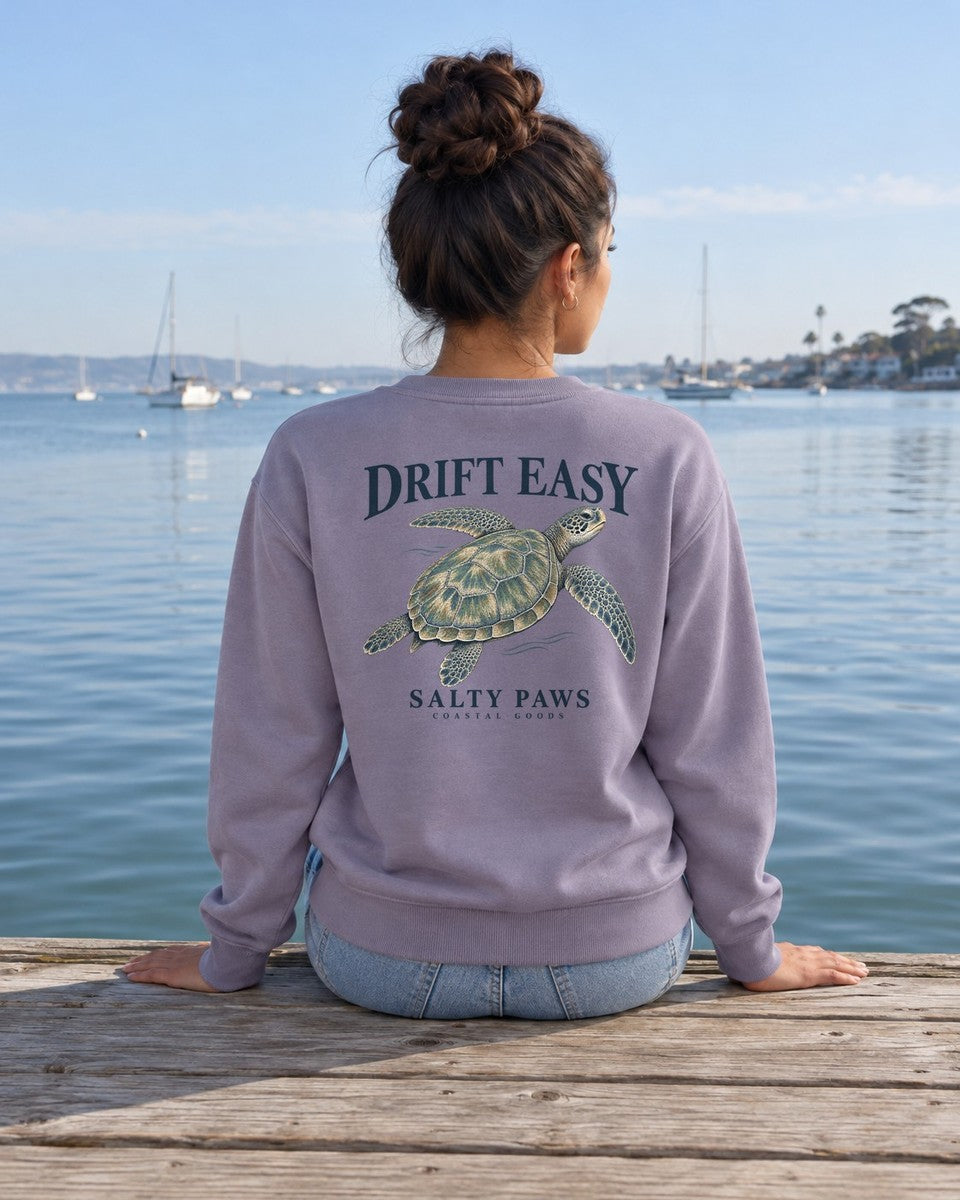 Drift Easy Sea Turtle Salty Paws Coastal Goods Back Design Midweight Sweatshirt in Paragon worn by a model, Salty Paws Midweight Sweatshirt