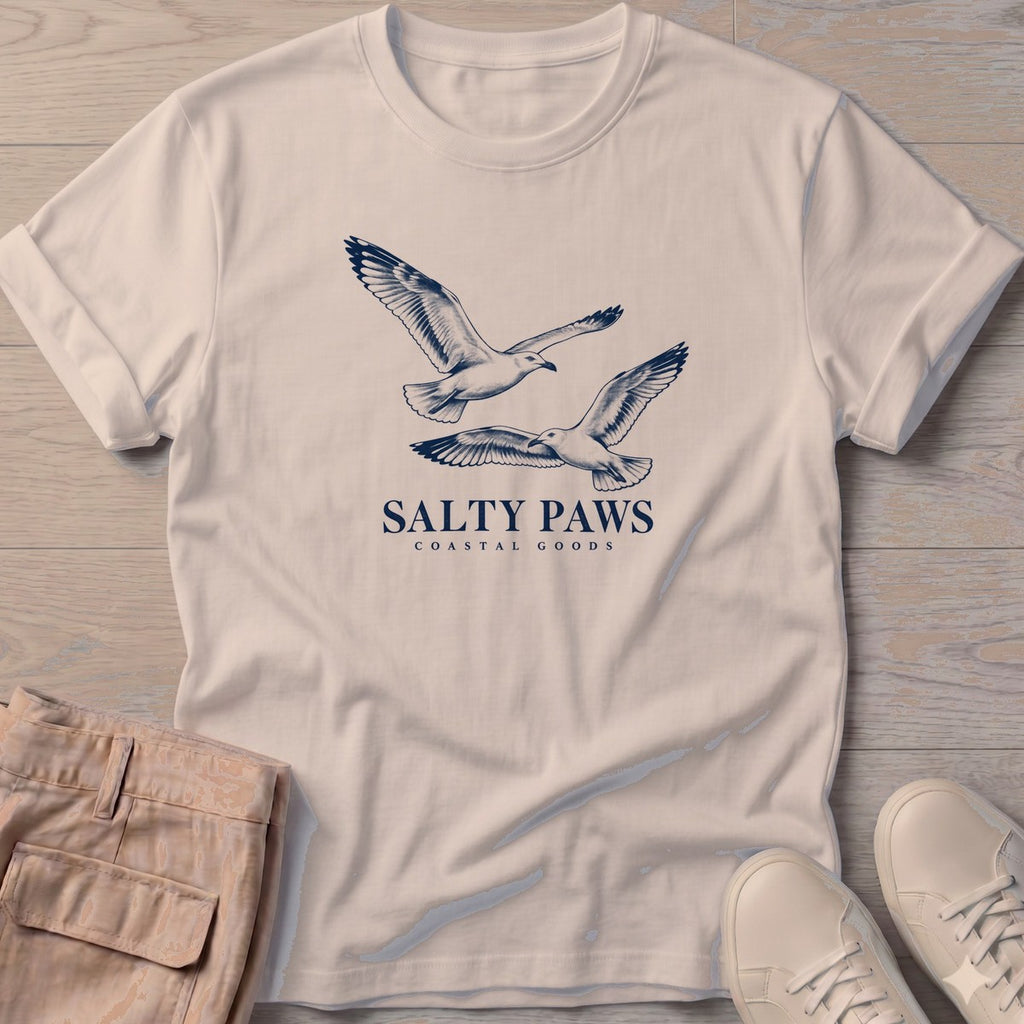 Gull Flight Coastal Goods T-Shirt in Sand, Salty Paws T-Shirt, front design flat lay