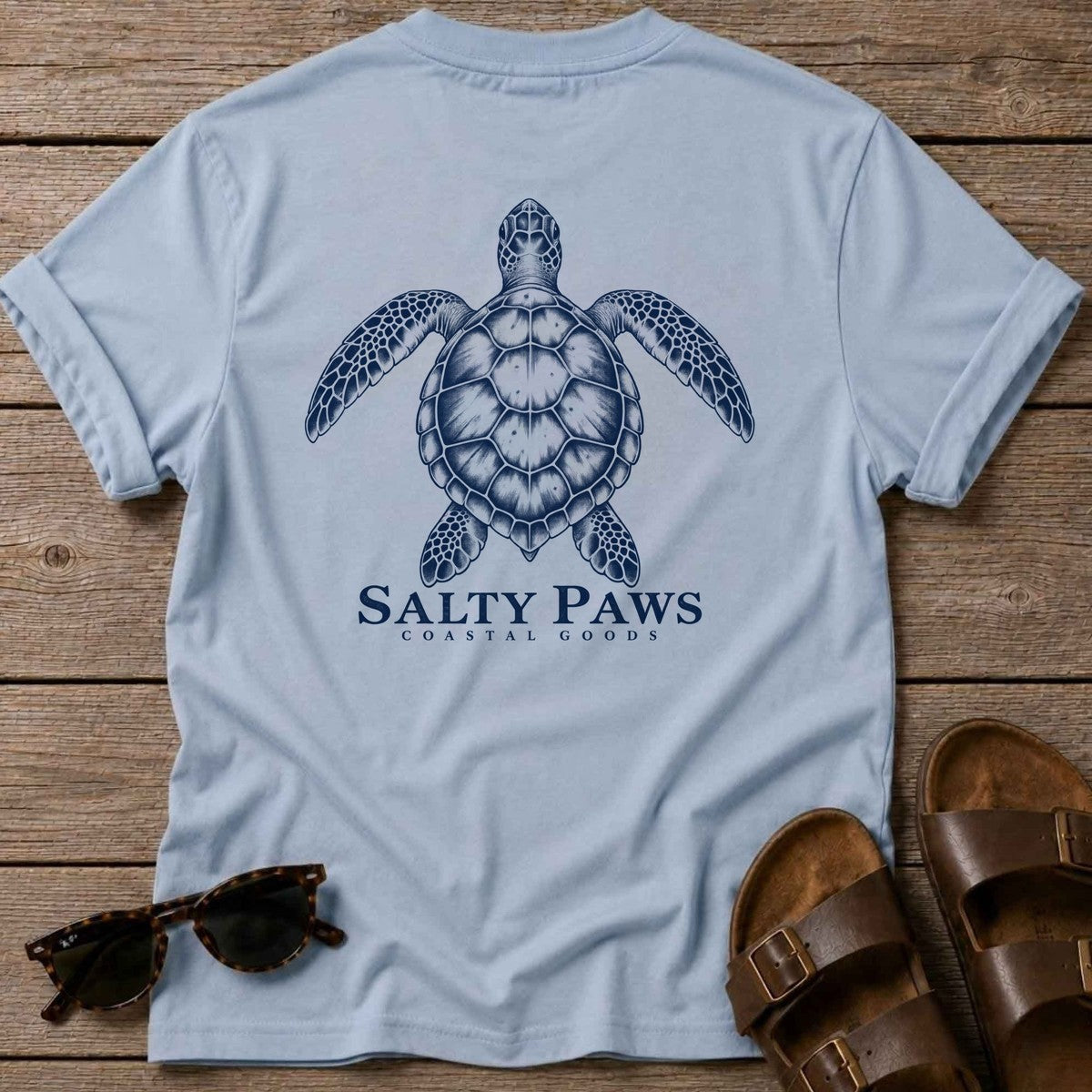 Sea Turtle Coastal Goods Back Design T-Shirt in Light Blue, Salty Paws T-Shirt, back design flat lay