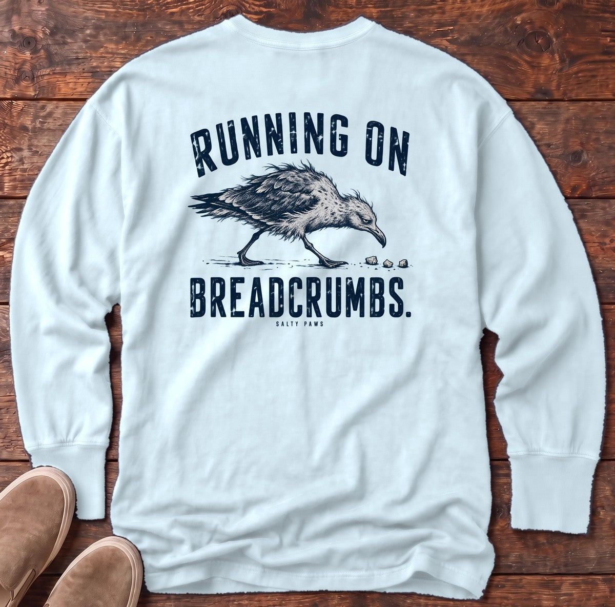 Running on Breadcrumbs Seagull Back Design Long Sleeve Tee in Chambray, Salty Paws Comfort Colors Long Sleeve Tee, back design flat lay