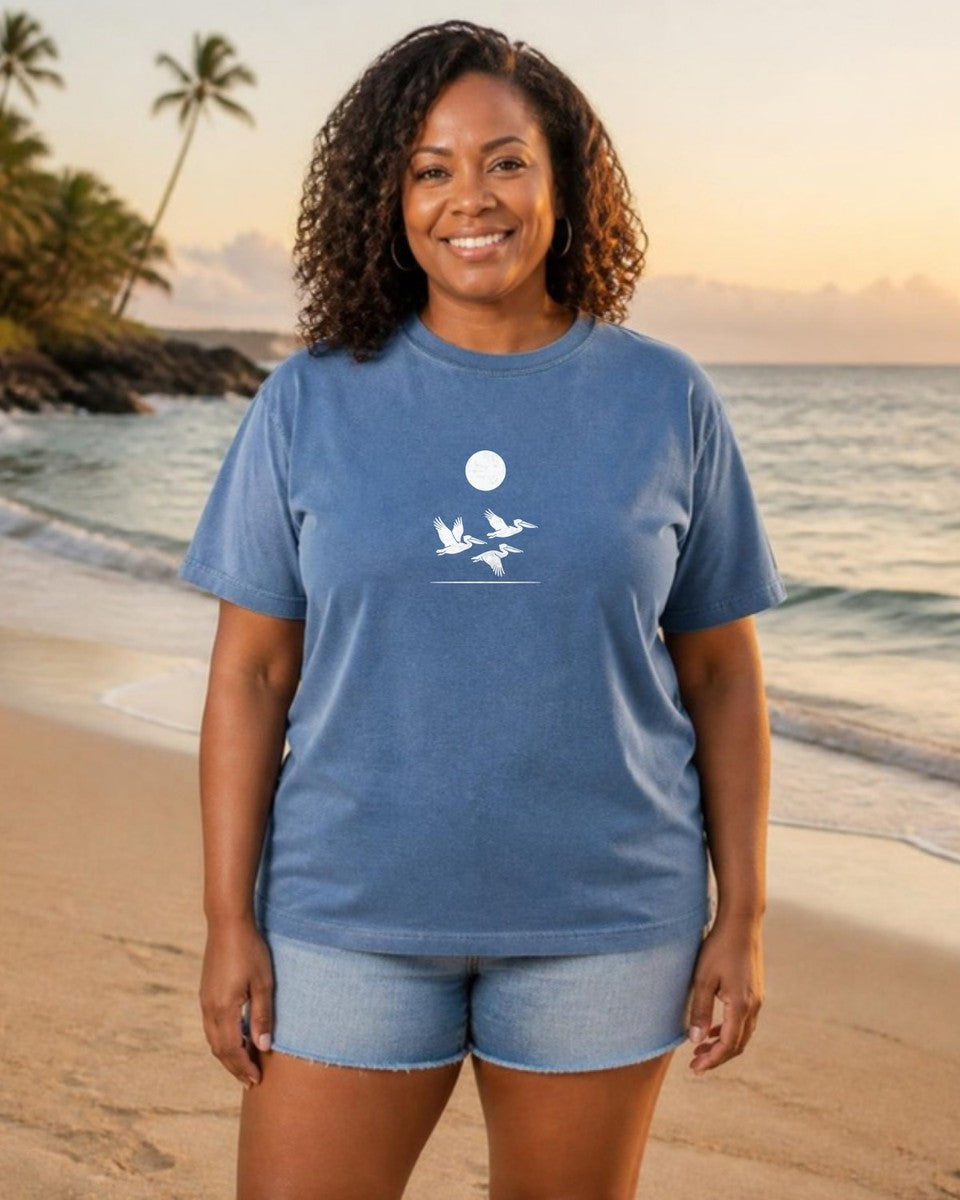 3 Pelicans Comfort Colors T-Shirt in Blue Jean, worn by a model