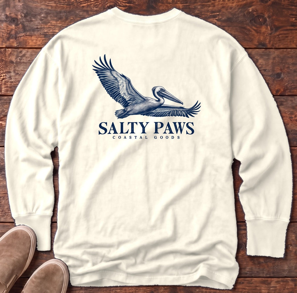 Gliding Pelican Coastal Goods Back Design Long Sleeve Tee in Ivory, Salty Paws Comfort Colors Long Sleeve Tee, back design flat lay