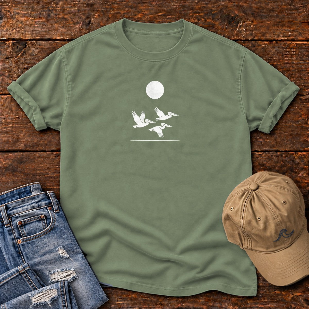 3 Pelicans Comfort Colors T-Shirt in Moss, front design flat lay