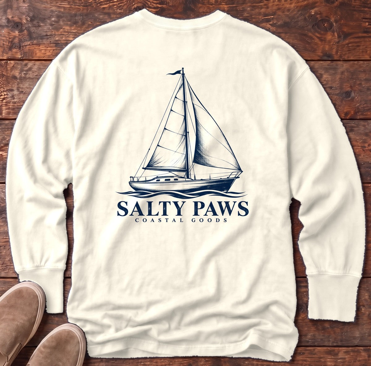 Sailboat Coastal Goods Back Design Long Sleeve Tee in Ivory, Salty Paws Comfort Colors Long Sleeve Tee, back design flat lay