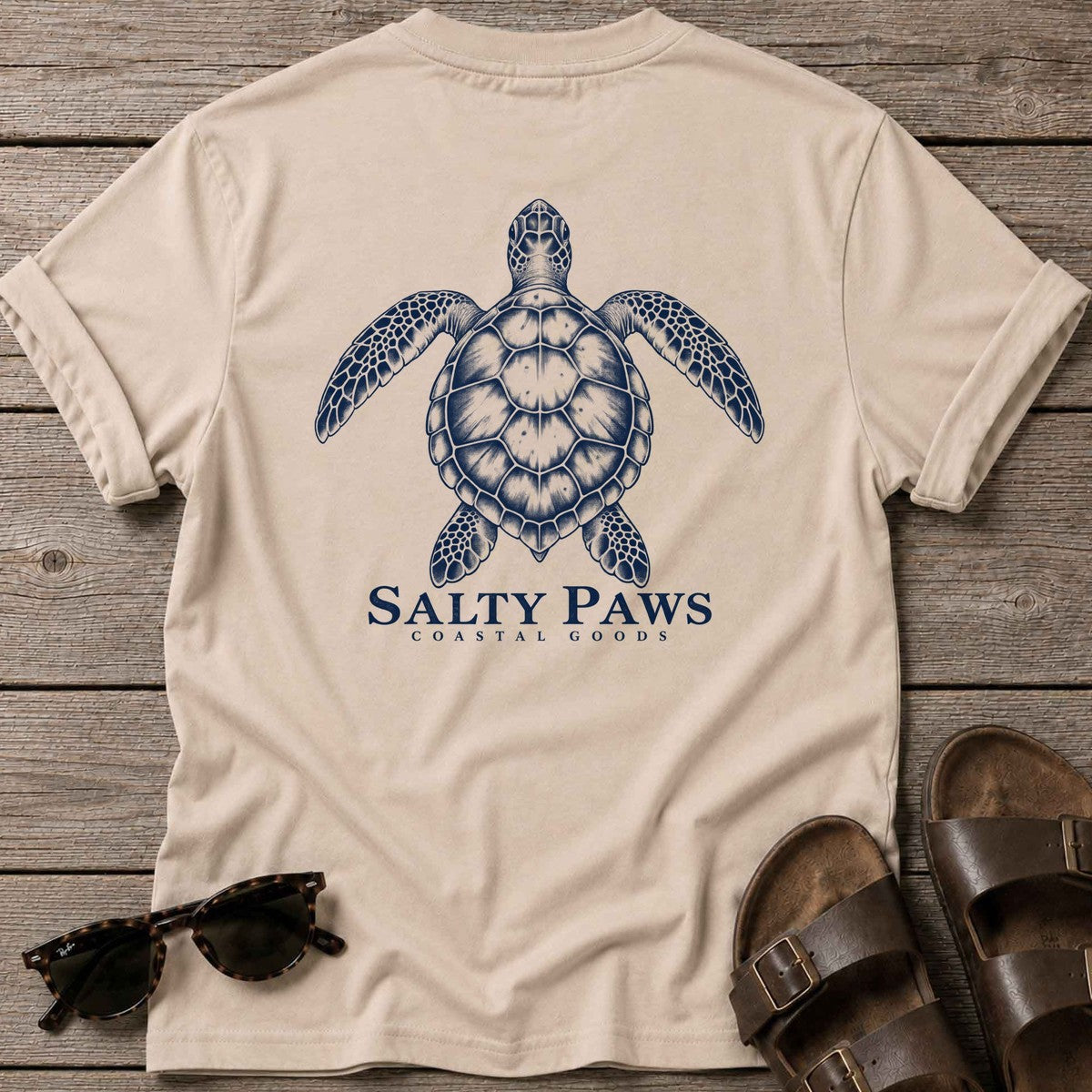 Sea Turtle Coastal Goods Back Design T-Shirt in Sand, Salty Paws T-Shirt, back design flat lay
