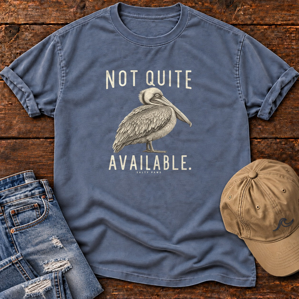 Not Quite Available Pelican T-Shirt in Blue Jean, Salty Paws Comfort Colors T-Shirt, front design flat lay