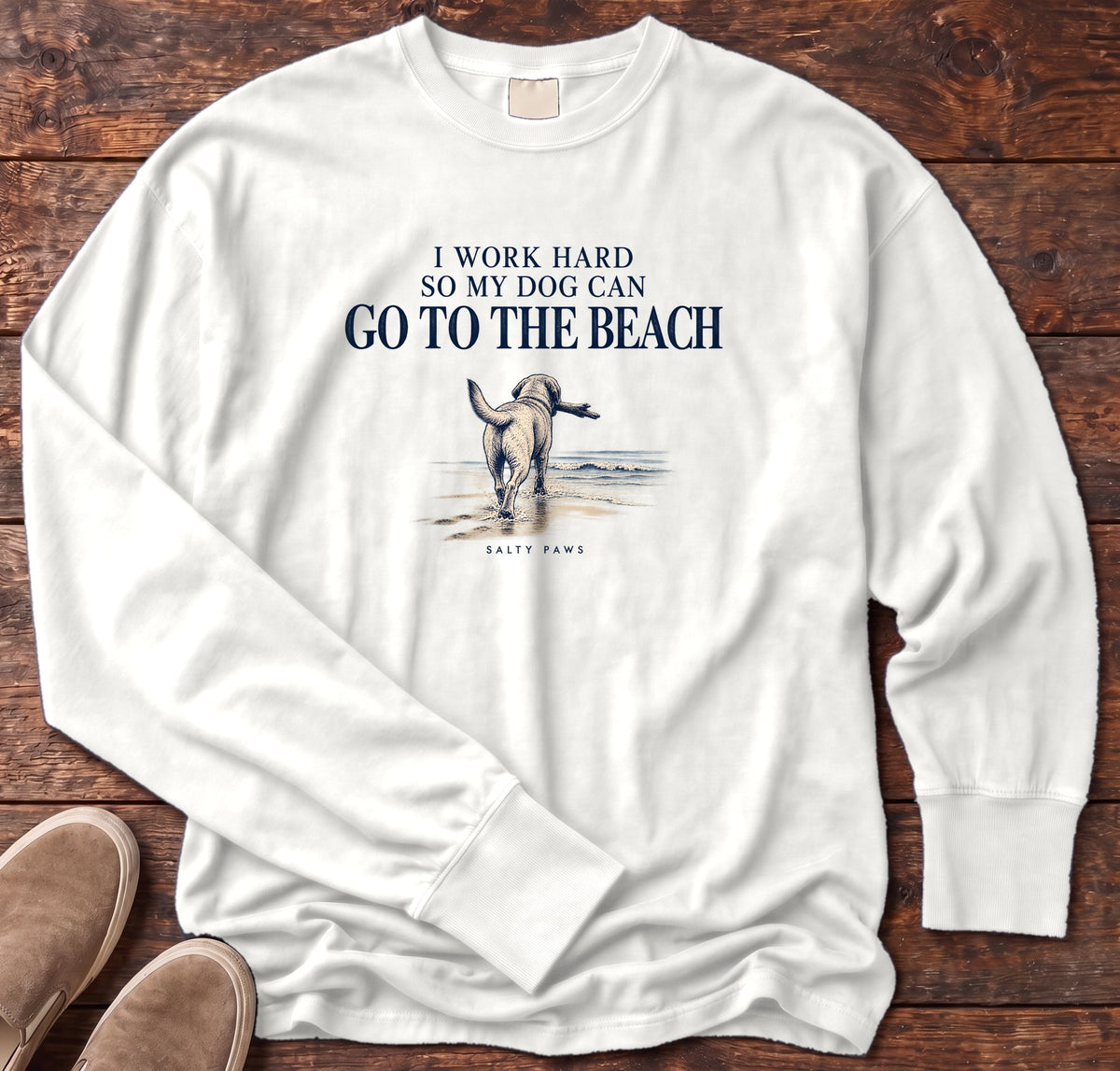 I Work Hard So My Dog Can Go to the Beach Long Sleeve Tee in White, Salty Paws Comfort Colors Long Sleeve Tee, front design flat lay