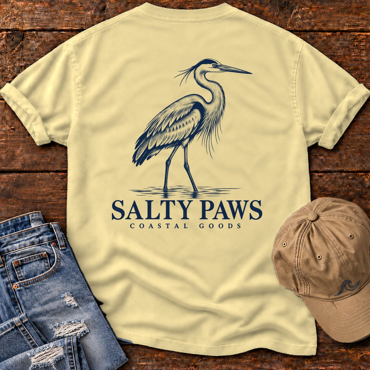 Great Blue Heron Coastal Goods Back Design T-Shirt in Butter, Salty Paws Comfort Colors T-Shirt, back design flat lay