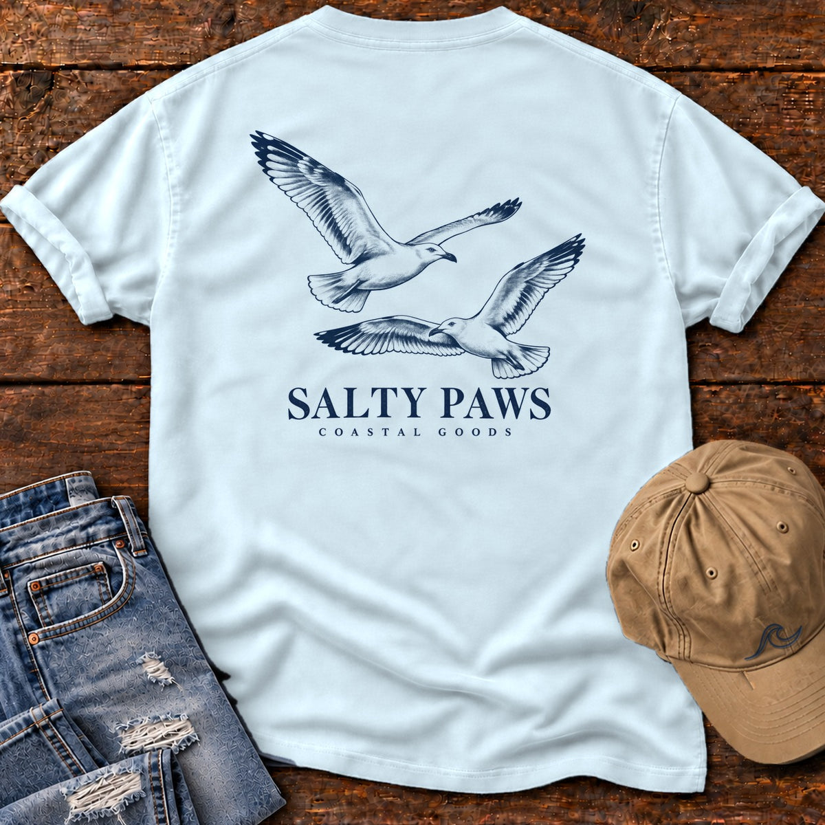 Gull Flight Coastal Goods Back Design T-Shirt in Chambray, Salty Paws Comfort Colors T-Shirt, back design flat lay