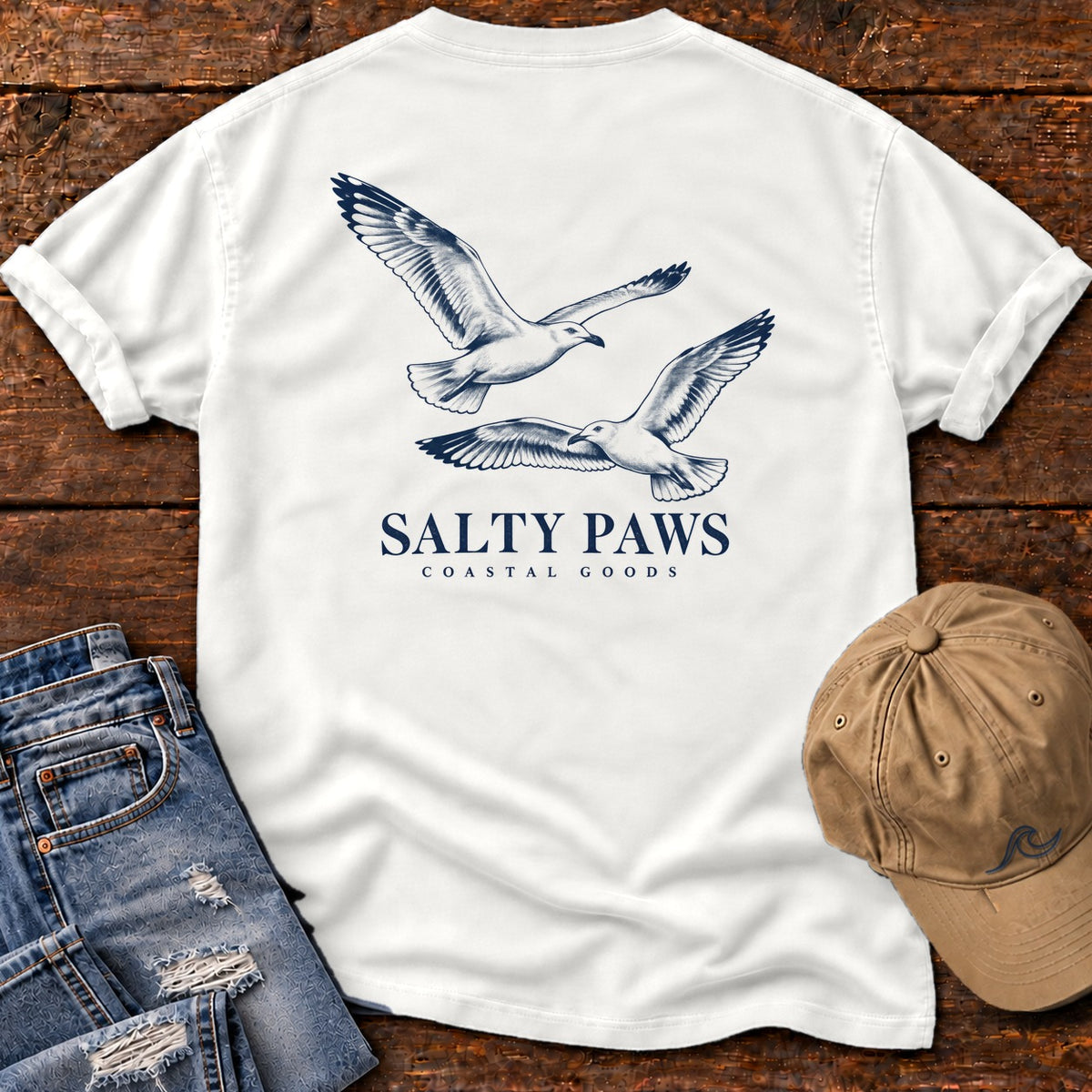 Gull Flight Coastal Goods Back Design T-Shirt in White, Salty Paws Comfort Colors T-Shirt, back design flat lay