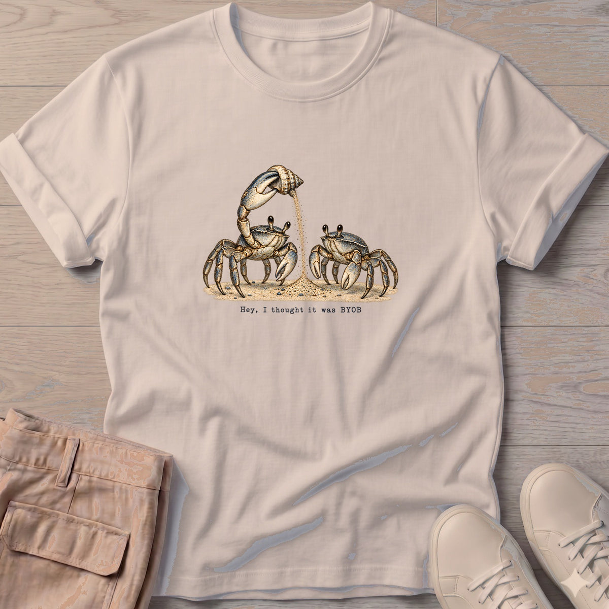 Hey, I Thought It Was BYOB Crabs T-Shirt in Sand, Salty Paws Soft Style T-Shirt, front design flat lay