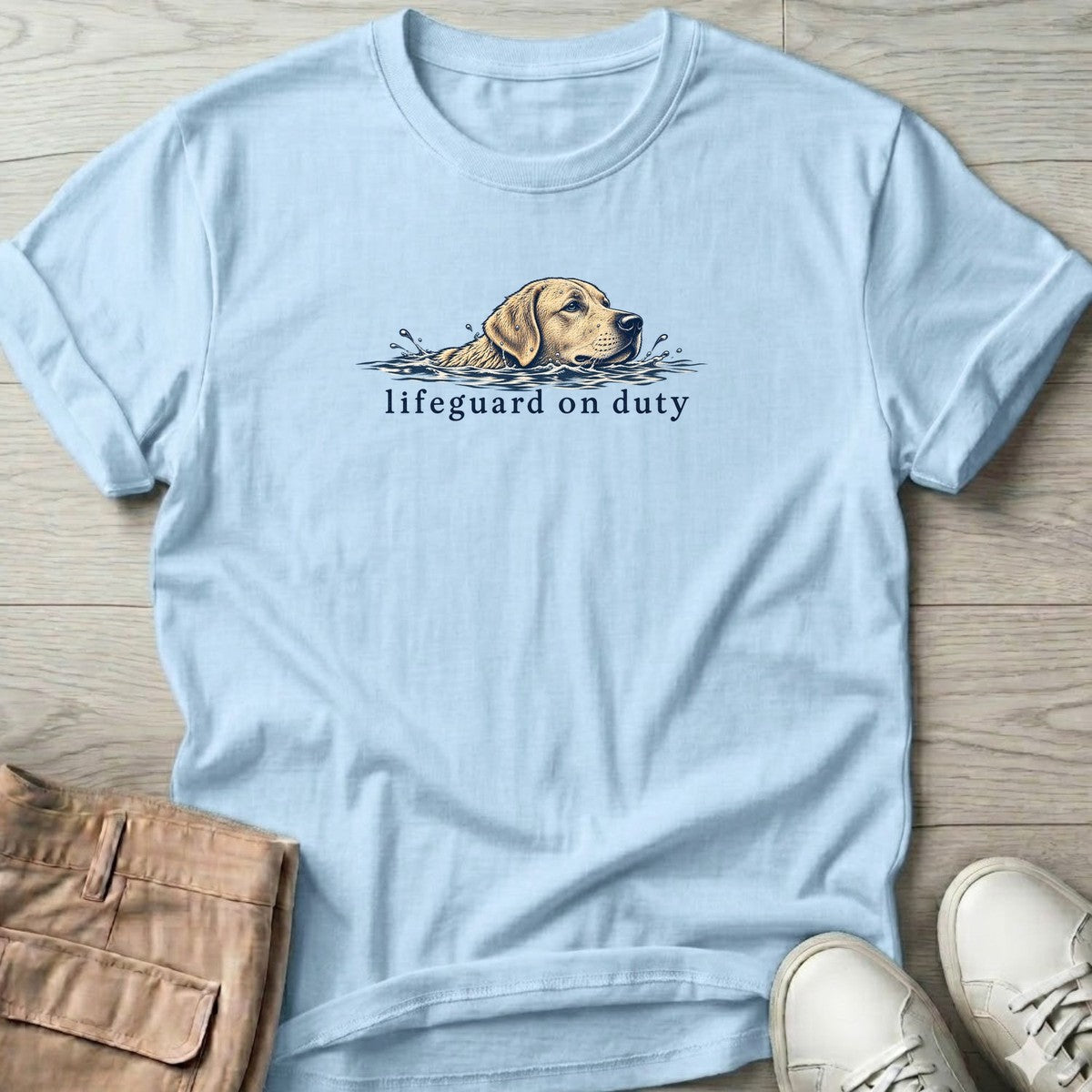 Lifeguard on Duty Yellow Lab T-Shirt in Light Blue, Salty Paws T-Shirt, front design flat lay