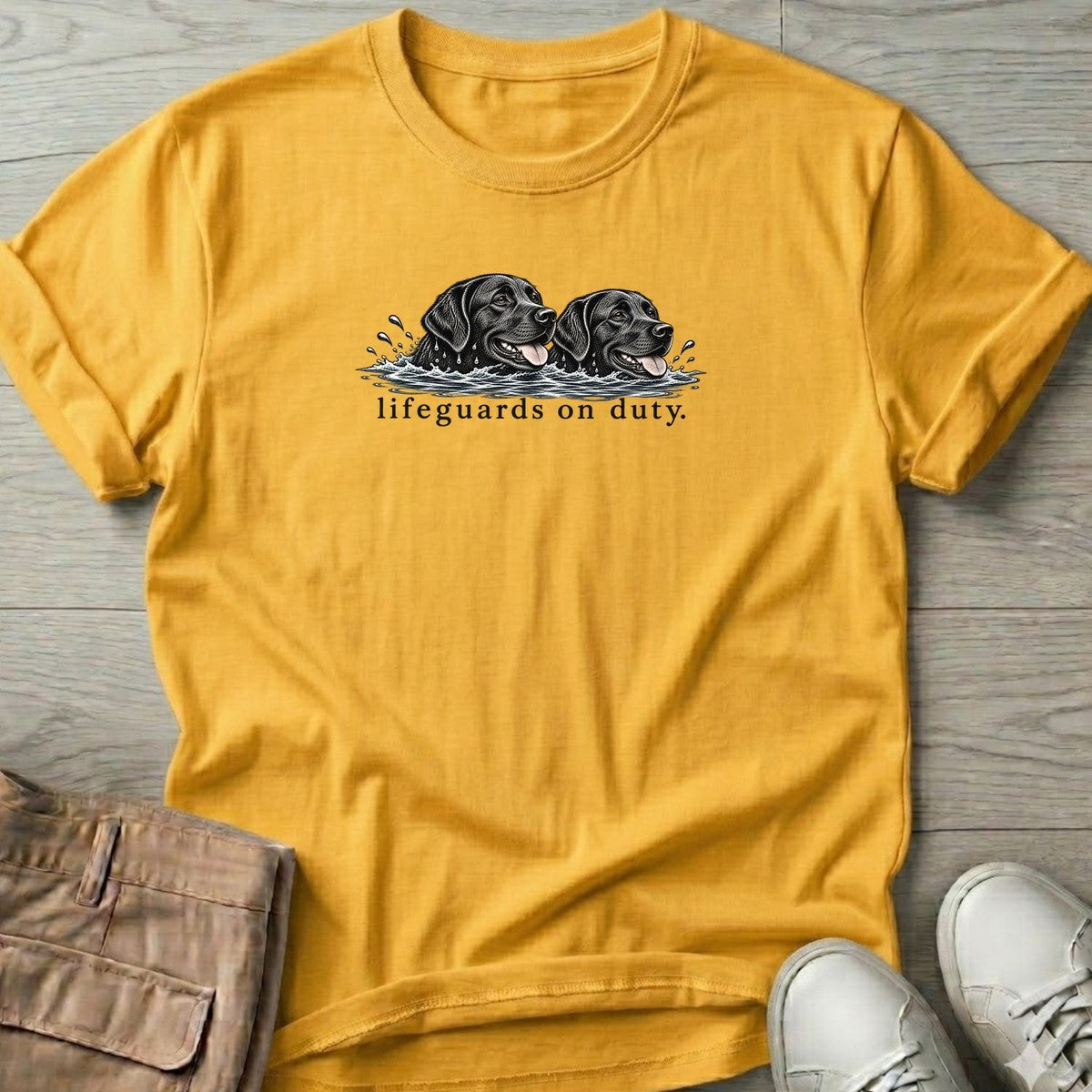 Lifeguards on Duty Black Labs T-Shirt in Daisy, Salty Paws T-Shirt, front design flat lay