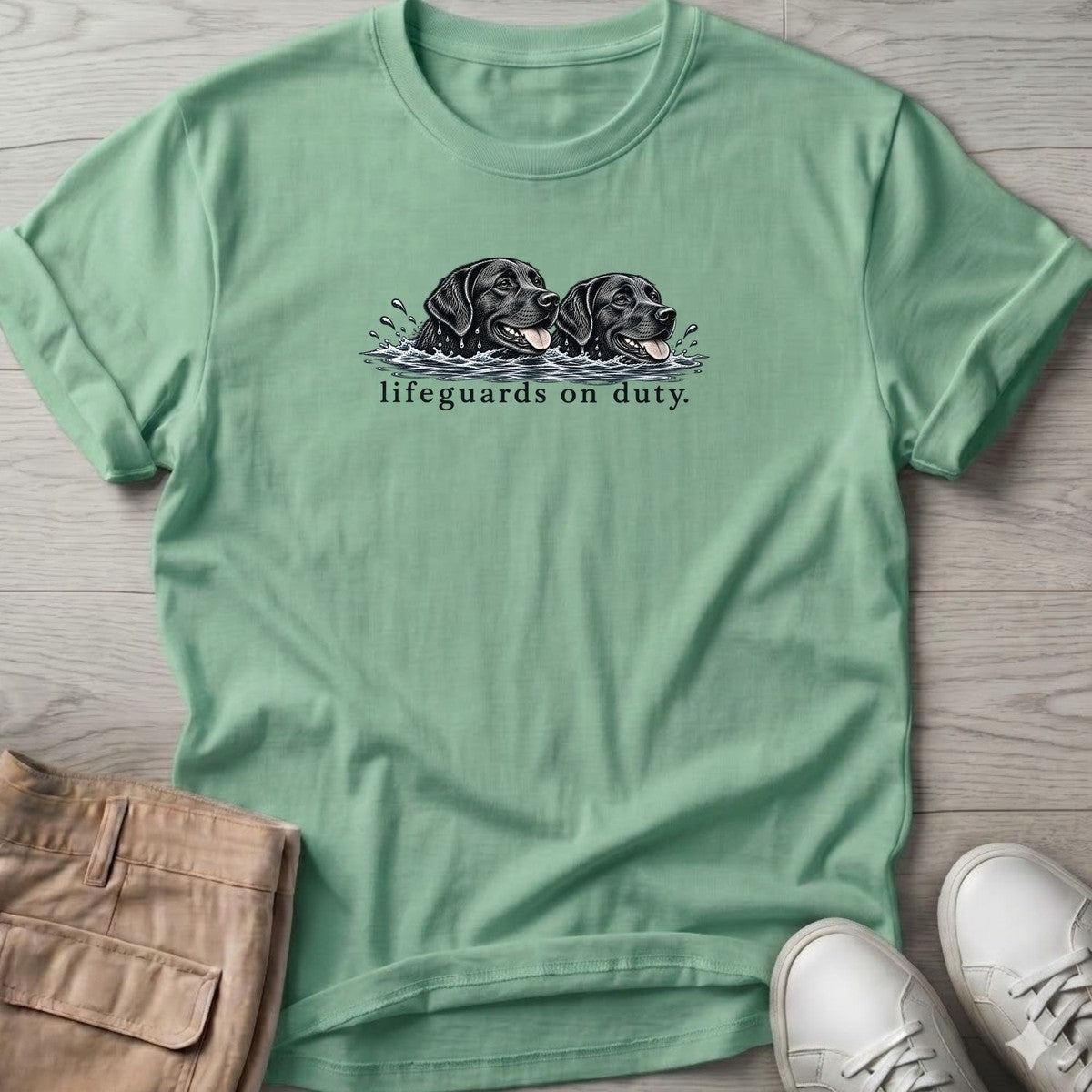 Lifeguards on Duty Black Labs T-Shirt in Mint Green, Salty Paws T-Shirt, front design flat lay