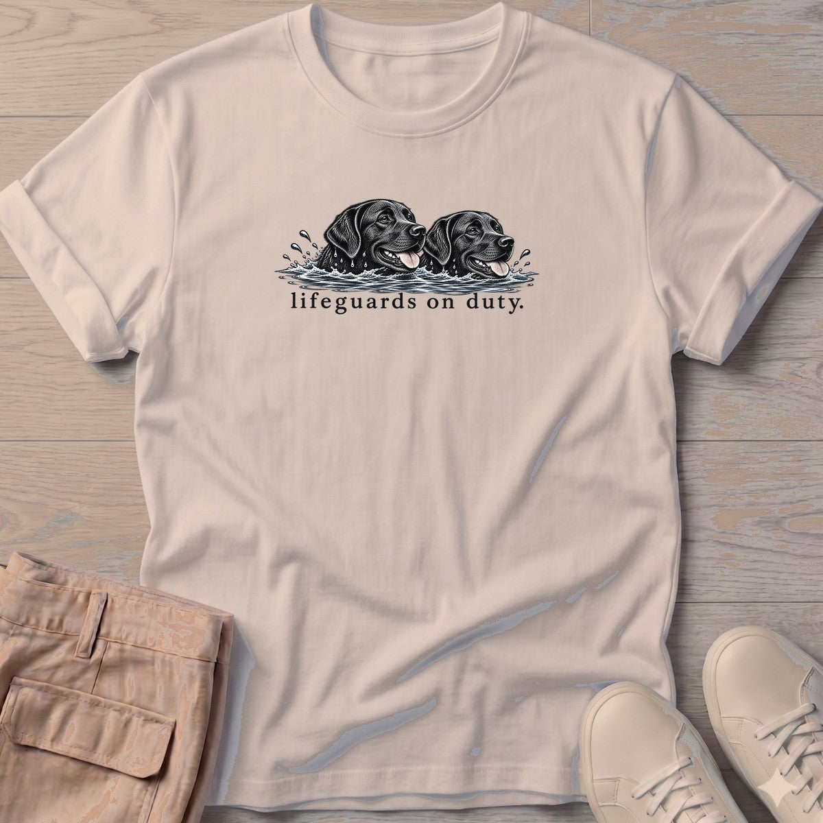 Lifeguards on Duty Black Labs T-Shirt in Sand, Salty Paws T-Shirt, front design flat lay
