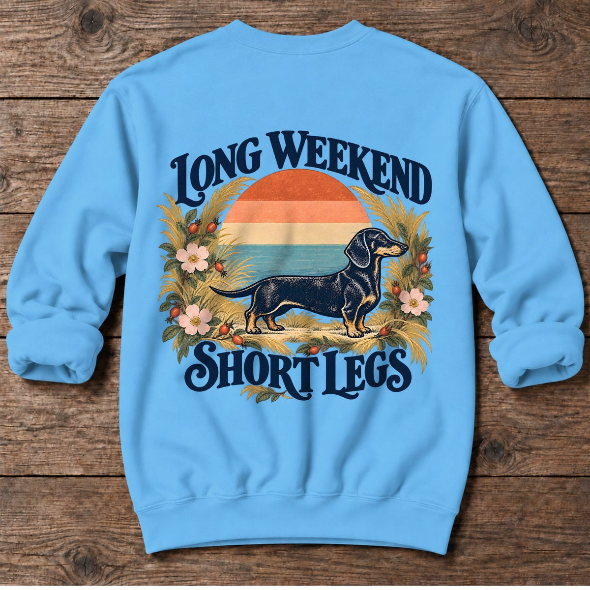 Long Weekend, Short Legs Dachshund Back Design Midweight Sweatshirt in Sky, Salty Paws Midweight Sweatshirt, back design flat lay