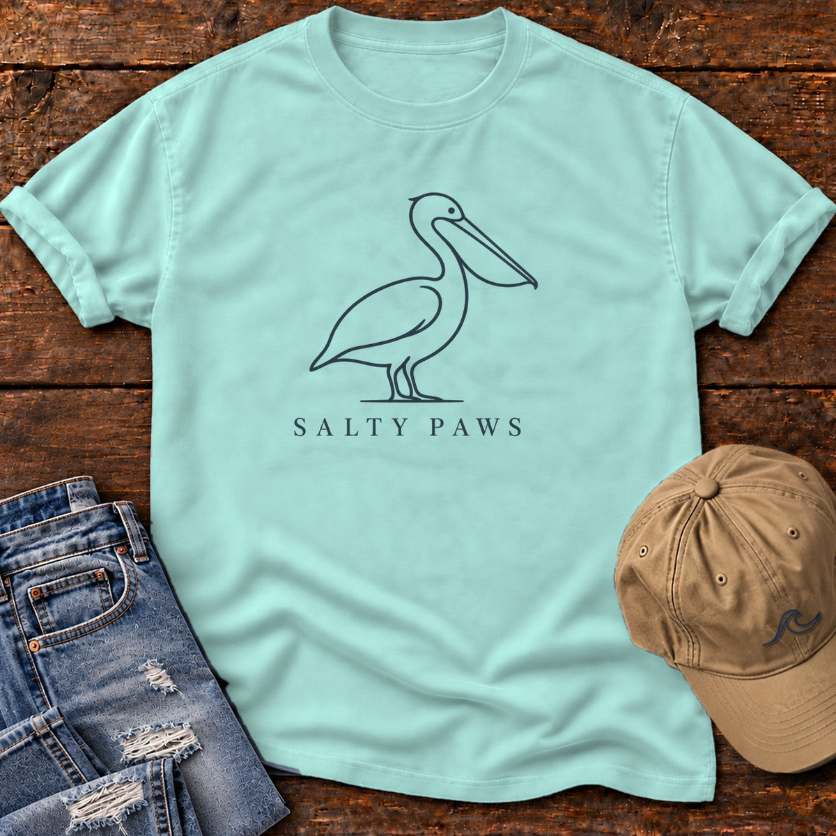 Minimal Pelican Salty Paws T-Shirt in Chalky Mint, Salty Paws Comfort Colors T-Shirt, front design flat lay