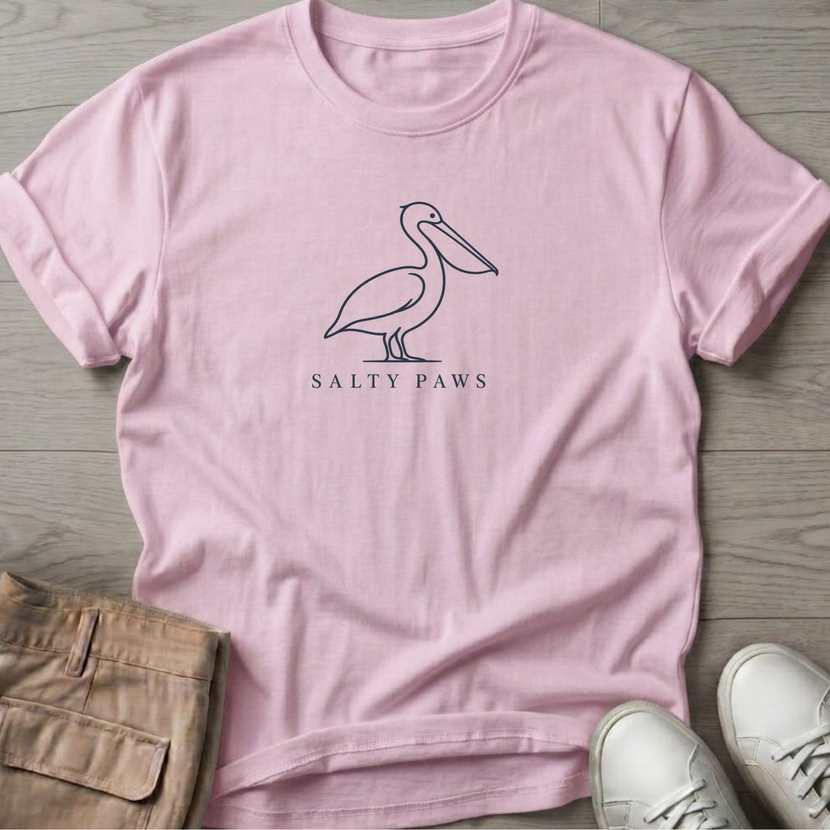 Minimal Pelican Salty Paws T-Shirt in Light Pink, Salty Paws Soft Style T-Shirt, front design flat lay