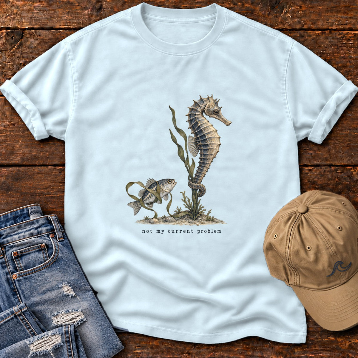 Not My Current Problem Seahorse T-Shirt Comfort Colors in Chambray, Salty Paws Comfort Colors T-Shirt, front design flat lay