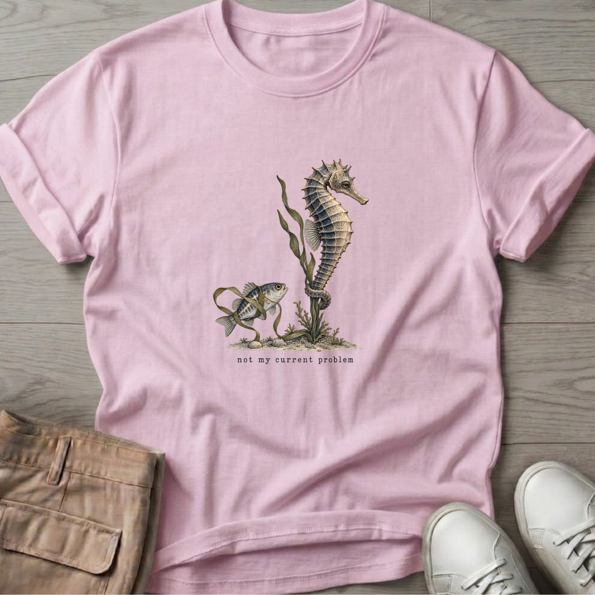 Not My Current Problem Seahorse T-Shirt in Light Pink, Salty Paws Soft Style T-Shirt, front design flat lay