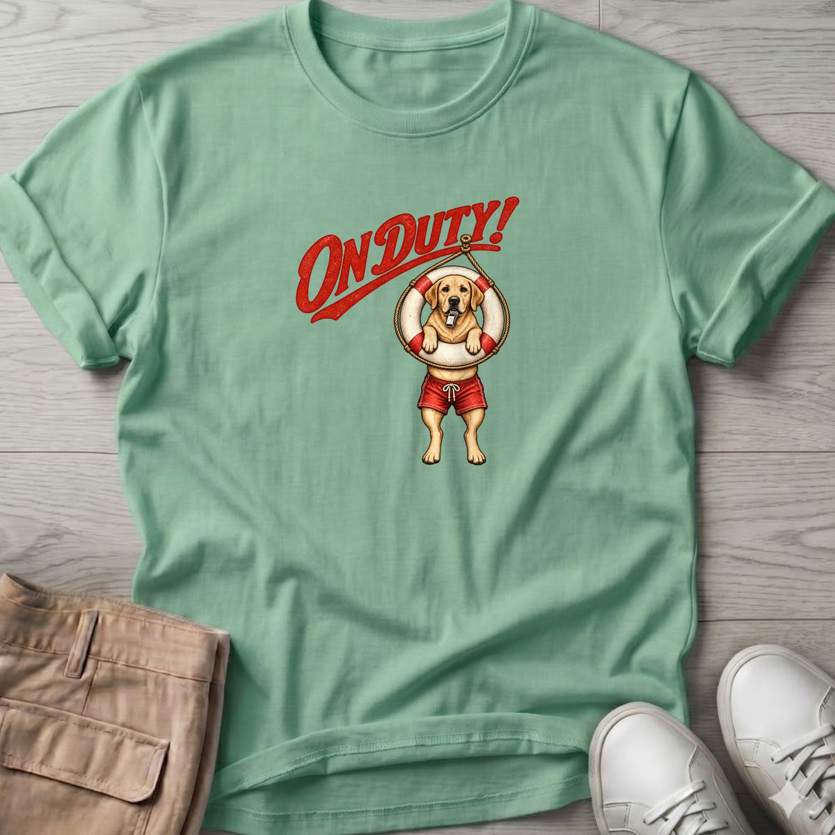 On Duty Lifeguard Yellow Labrador T-Shirt in Mint Green, Salty Paws Soft Style T-Shirt, front design flat lay