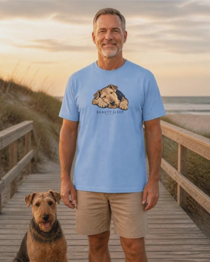 Beauty Sleep Airedale Terrier T-Shirt in Chambray worn on a beach boardwalk with an Airedale terrier, Salty Paws Comfort Colors T-Shirt