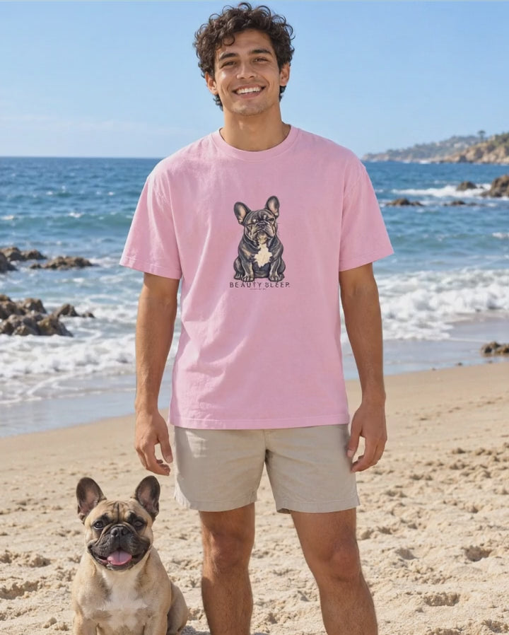 Beauty Sleep French Bulldog T-Shirt in Blossom worn on the beach with a French bulldog, Salty Paws Comfort Colors T-Shirt