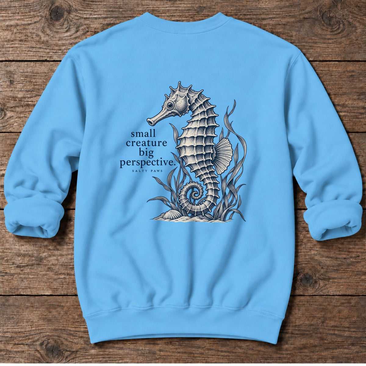 Small Creature, Big Perspective Seahorse Back Design Midweight Sweatshirt in Sky, Salty Paws Midweight Sweatshirt, back design flat lay