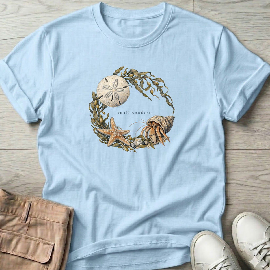 Small Wonders Sand Dollar T-Shirt in Light Blue, Salty Paws Soft Style T-Shirt, front design flat lay