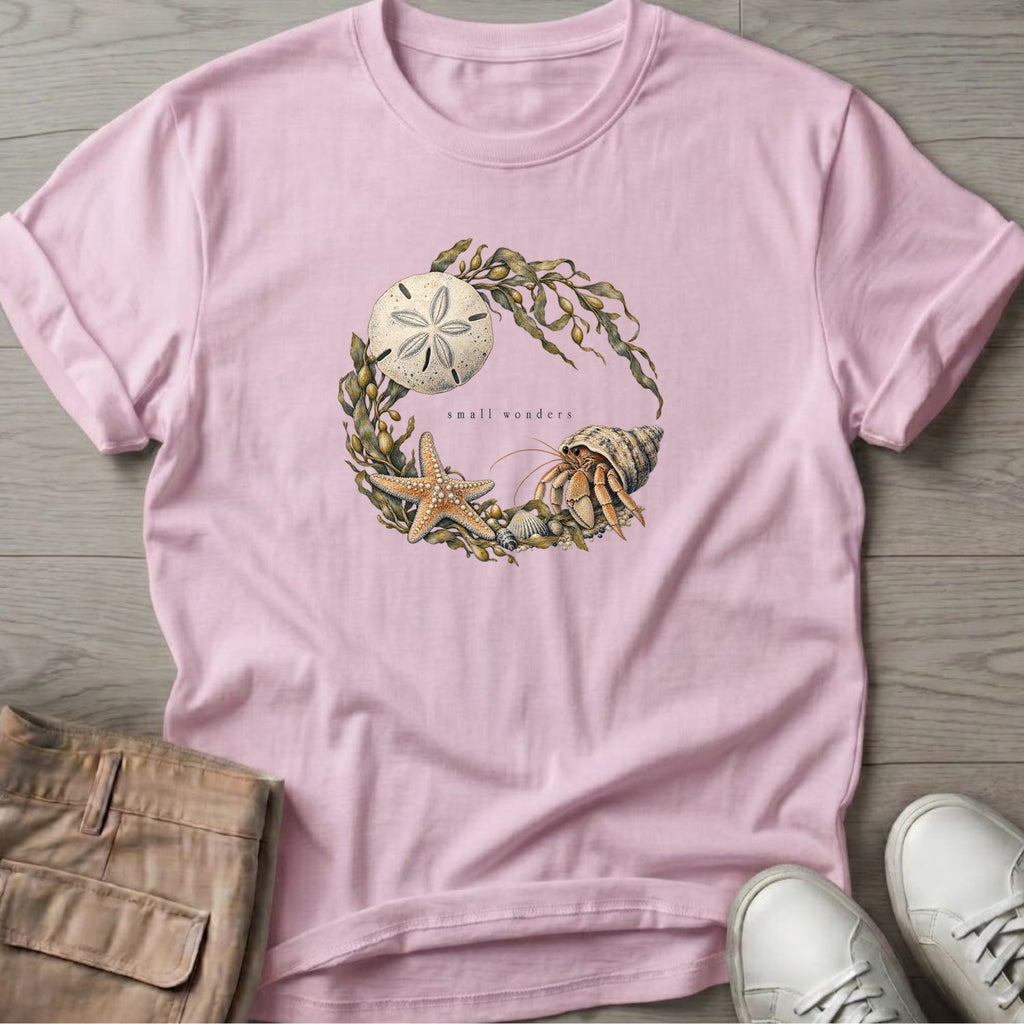 Small Wonders Sand Dollar T-Shirt in Light Pink, Salty Paws Soft Style T-Shirt, front design flat lay