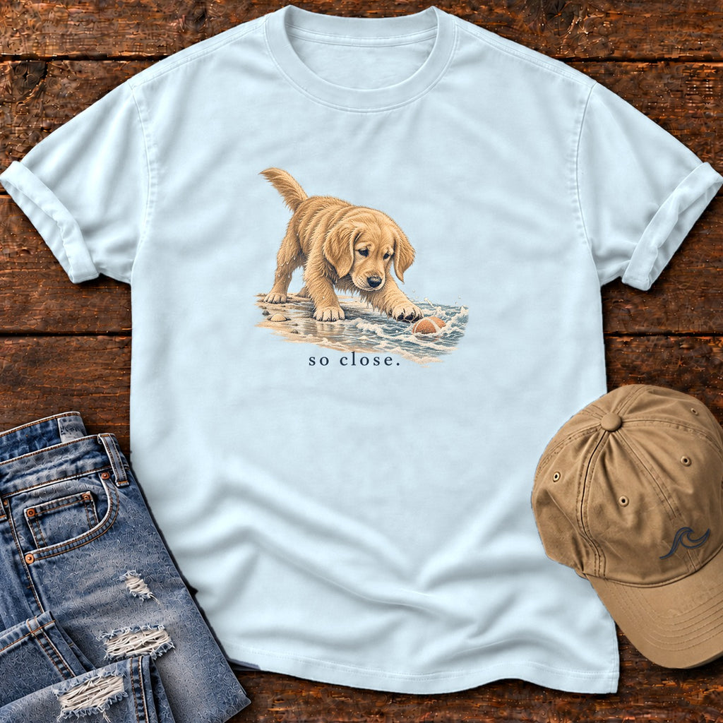 So Close Golden Retriever Puppy T-Shirt in Chambray, Salty Paws Comfort Colors T-Shirt, front design flat lay