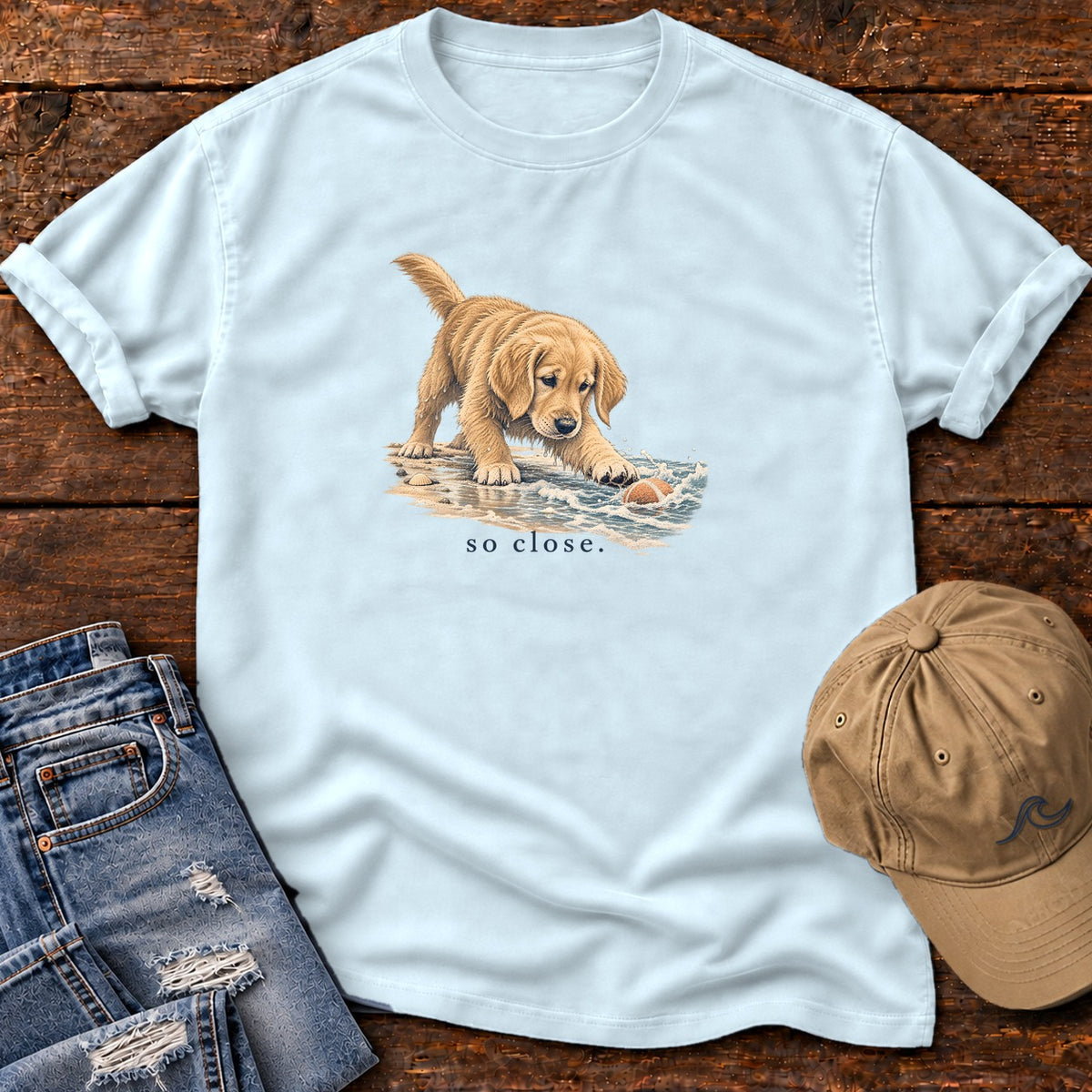 So Close Golden Retriever Puppy T-Shirt in Chambray, Salty Paws Comfort Colors T-Shirt, front design flat lay