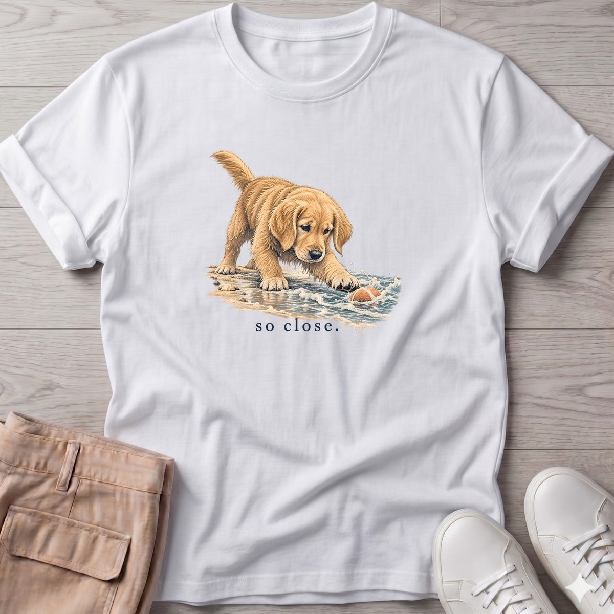 So Close Golden Retriever Puppy T-Shirt in White, Salty Paws Soft Style T-Shirt, front design flat lay